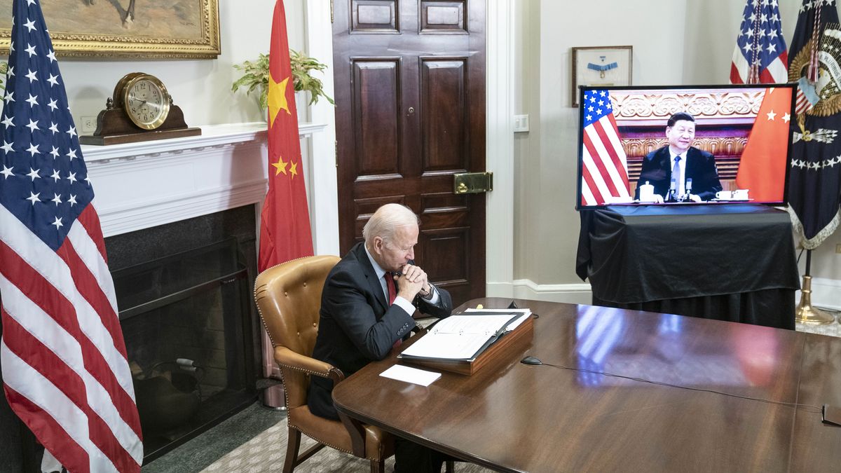 U.S. President Joe Biden listens while meeting virtually with Xi Jinping, China's president, in the Roosevelt Room of the White House in Washington, D.C., U.S., on Monday, Nov. 15, 2021. With trade, Taiwan and China's economic practices on the agenda, the U.S. is hoping to put "guardrails" on the relationship so things don't worsen. Photographer: Sarah Silbiger/UPI/Bloomberg via Getty Images
