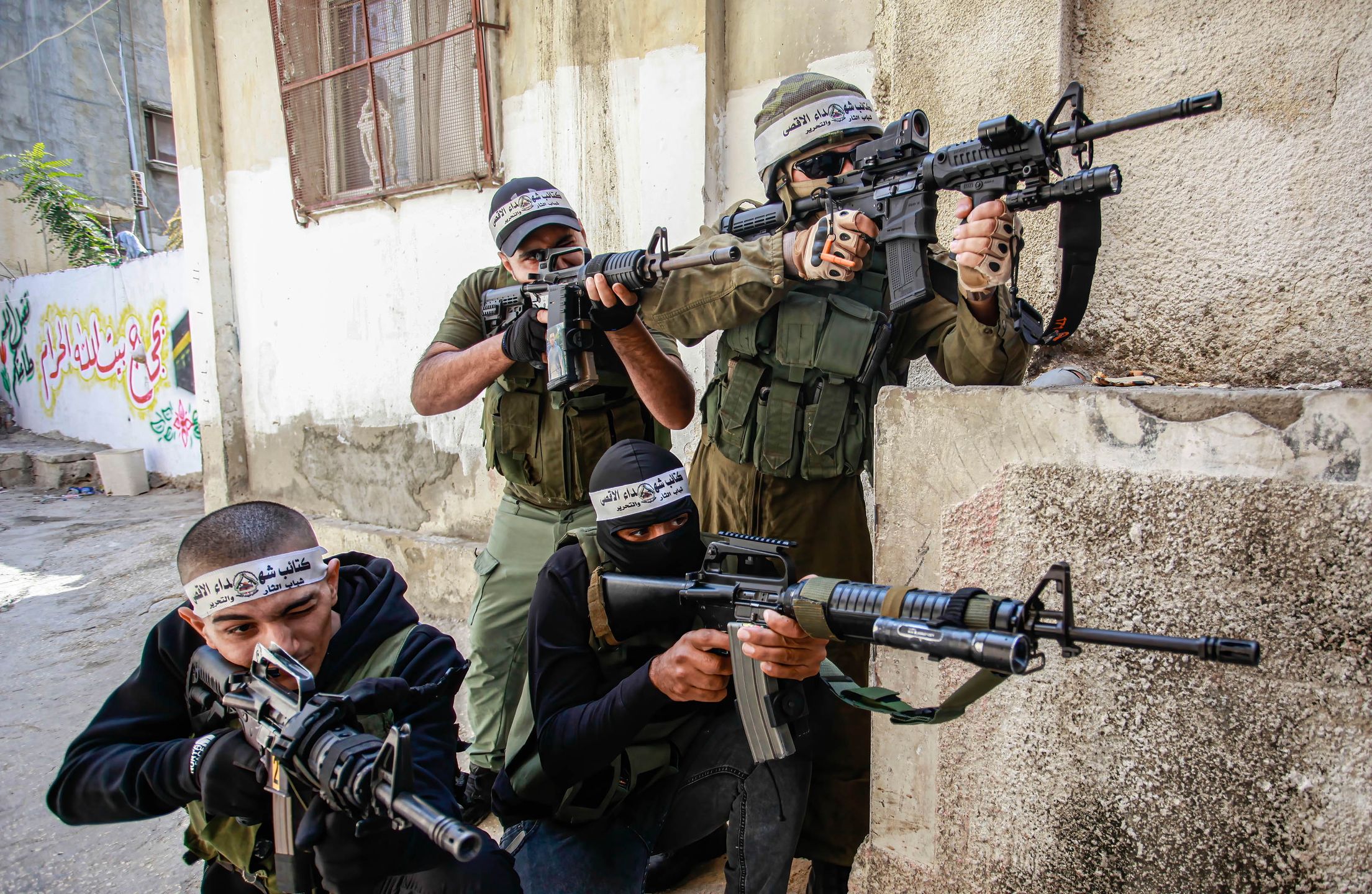 Palestinian armed resistance fighters from the Tulkarm
TULKARM, WEST BANK, PALESTINE - 2023/10/14: Palestinian armed resistance fighters from the Tulkarm Brigade carry out military maneuvers after Israeli forces killed 6 Palestinians from Tulkarm during their recent raids, in the Tulkarm Palestinian refugee camp in the northern West Bank. (Photo by Nasser Ishtayeh/SOPA Images/LightRocket via Getty Images)
SOPA Images
armed resistance fighters, military maneuvers, tulkarm brigade, conflicts, israeli - palestine conflicts, militants, resistance, fighters