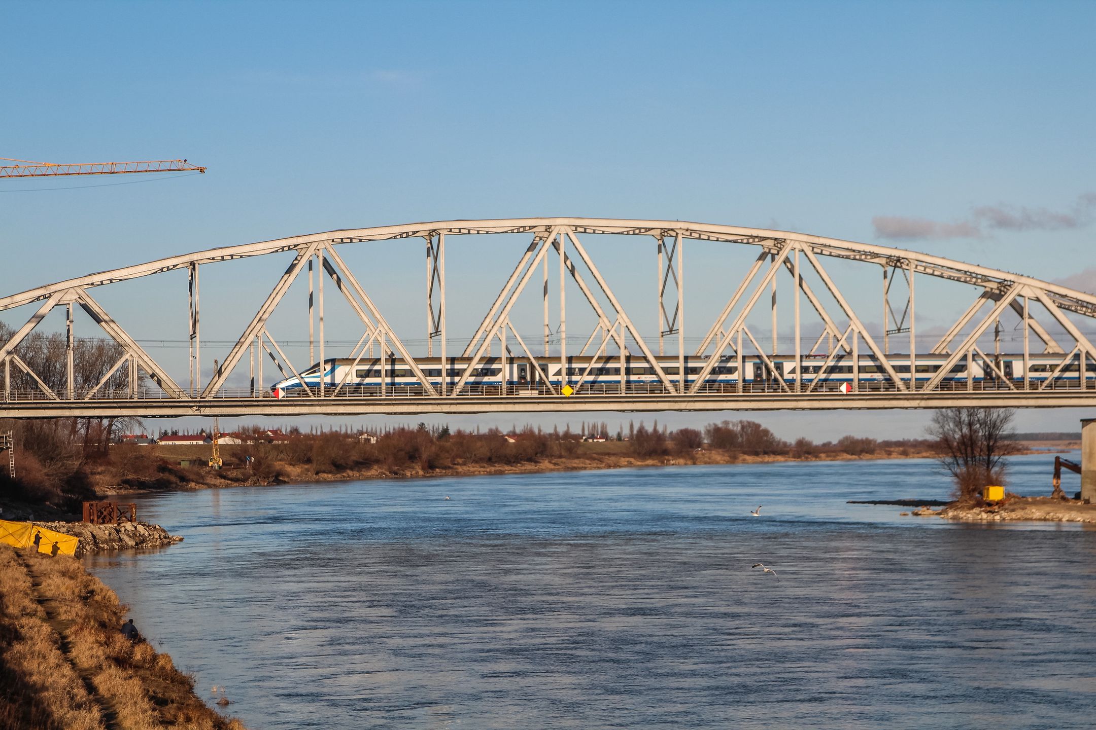 Pendolino train belonging to the PKP Intercity (IC) state owned company passing the bridge over the Vistula (Wisla) River  is seen in Tczew, Poland on 5 January 2020  (Photo by Michal Fludra/NurPhoto via Getty Images)