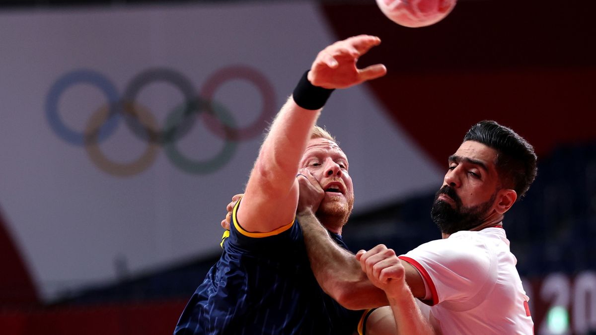 PAP/EPA / Wu Hong / Na zdjęciu od lewej: Jim Gottfridsson oraz Ali Merza Ali