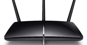 Dwa routery i karta sieciowa w standardzie 802.11ac