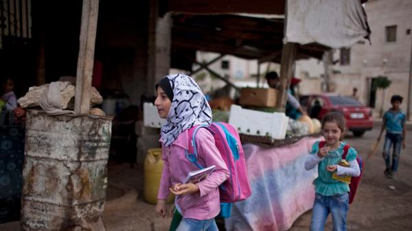 W wojnie domowej w Syrii najbardziej cierpią dzieci.Niemal połowa nie chodzi do szkoły
