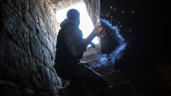 Syryjski rebeliant walczący w Aleppo