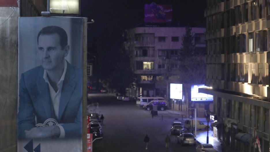 Temporary
A giant portrait of Syrian president Bashar Assad sets on a building, as empty streets seen in Damascus, Syria, Saturday, Dec. 7, 2024. (AP Photo/Omar Sanadiki)
Omar Sanadiki