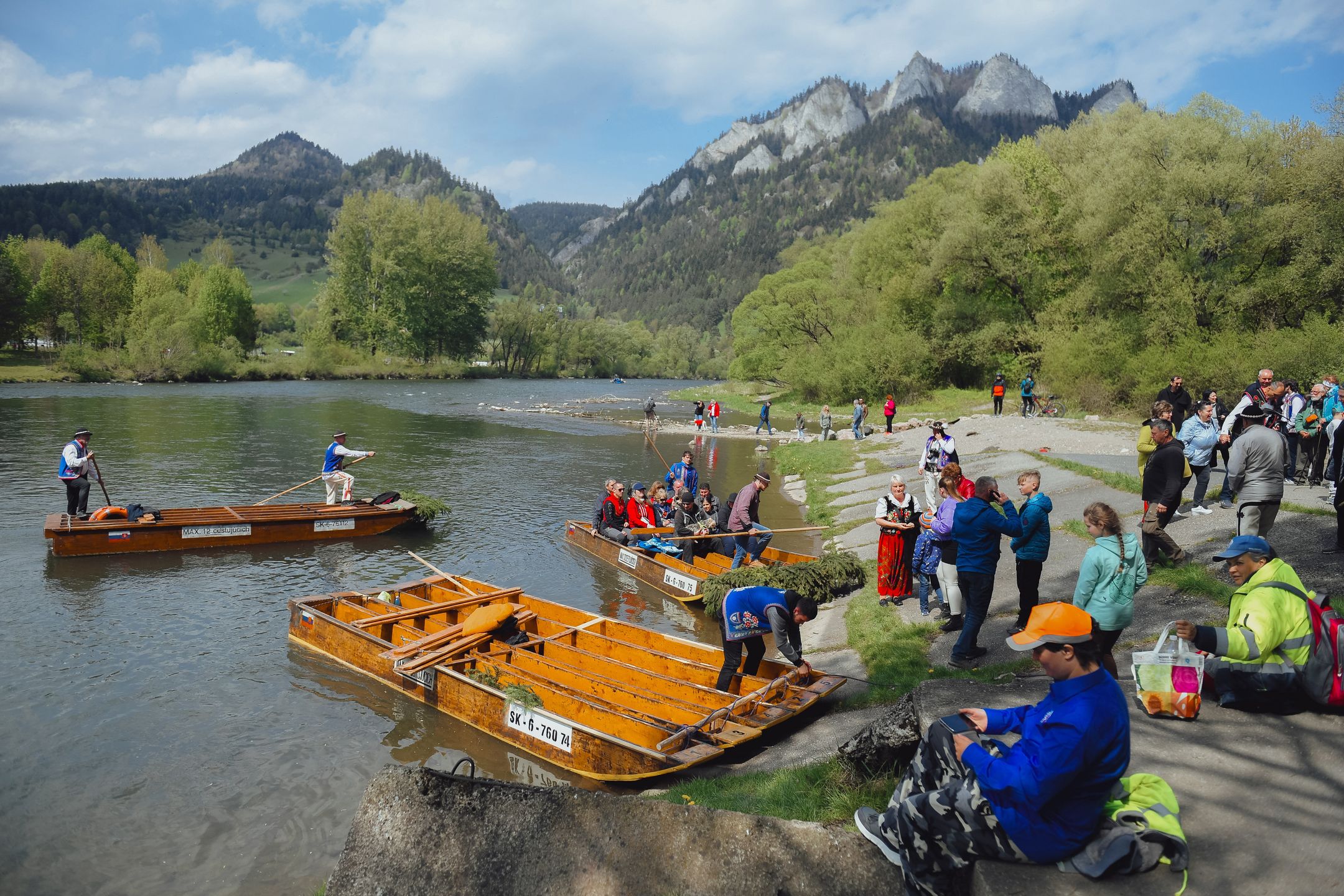 CERVENY KLASTOR, SLOVAKIA - APRIL 28: Tourists during a rafting trip on wooden rafts on the Dunajec River after the opening of the summer tourist season and the start of the rafting season in Cerveny Klastor, Slovakia on 28 April 2024. The Zamagur village of Cerveny Klastor is located in the district of Kezmarok, it is situated in the Dunajec valley and is a border village with Poland. Although it is a small village with just over 200 inhabitants, many tourists come here every summer, also for rafting on the rived Dunajec. (Photo by Robert Nemeti/Anadolu via Getty Images)