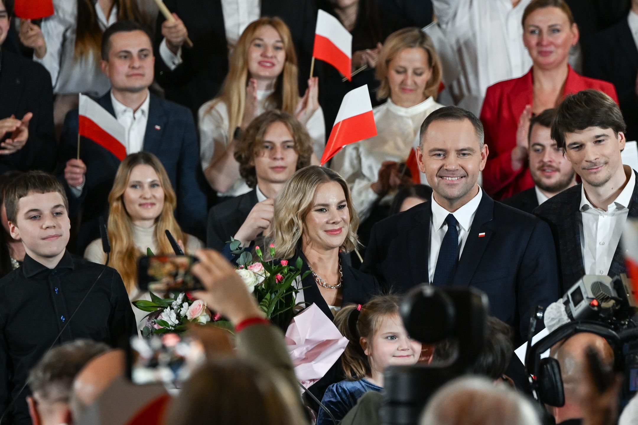 Law And Justice Party Nominates Karol Nawrocki For 2025 Presidential Election
KRAKOW, POLAND - NOVEMBER 24:
Karol Nawrocki (center right), the Law and Justice party's candidate for the 2025 presidential election, with his wife Marta Nawrocka (center left), sons Daniel (right) and Antek (left), and daughter Kasia (center),, on November 24, 2024, in Krakow, Poland.
The announcement came one day after the governing Civic Platform party nominated Rafal Trzaskowski as its candidate in the primaries. (Photo by Artur Widak/NurPhoto via Getty Images)
NurPhoto
november 24, daniel nawrocki, antek nawrocki, candidate announcement, primaries, marta nawrocka, governing party, law and justice party, opposition, rafal trzaskowski, kasia nawrocka, sons, 2025 presidential election