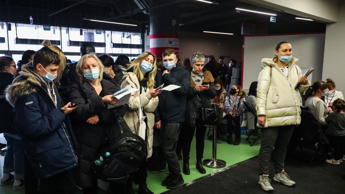 Refugees from Ukraine who fled to Poland after Russian attack are standing in a line to the register point at Tauron Arena to obtain a PESEL national identification number and remain in the country. Krakow, Poland on March 16, 2022. Russian invasion on Ukraine causes a mass exodus of refugees to Poland.   (Photo by Beata Zawrzel/NurPhoto via Getty Images)