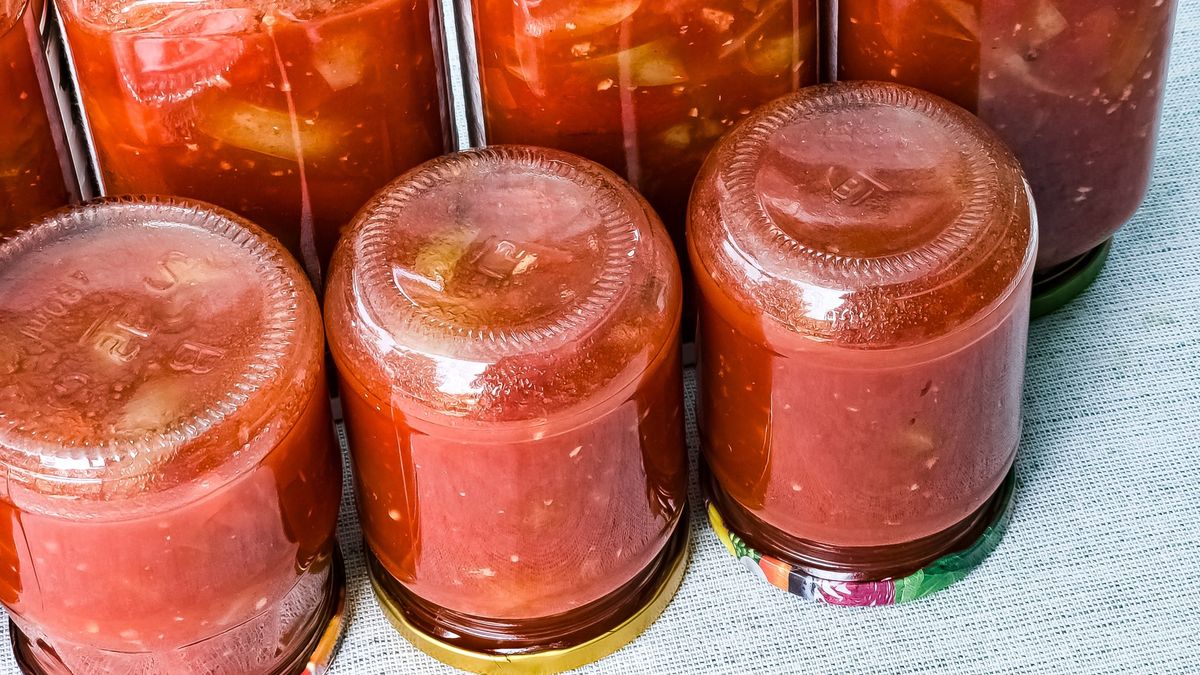 Traditional Hungarian homemade lecho in glass jars. Preserved tomatoes and peppers with spices.Traditional Hungarian homemade lecho in glass jars. Preserved tomatoes and peppers with spices.AntaresNSlecho, peppers, preservation, canned, glass, pepper, green, tomatoes, harvest, vegetables, national, eat, ready, jars, mixture, hungarian, conservation, sweet, cuisine, tasty, conserve, natural, bank, home, product