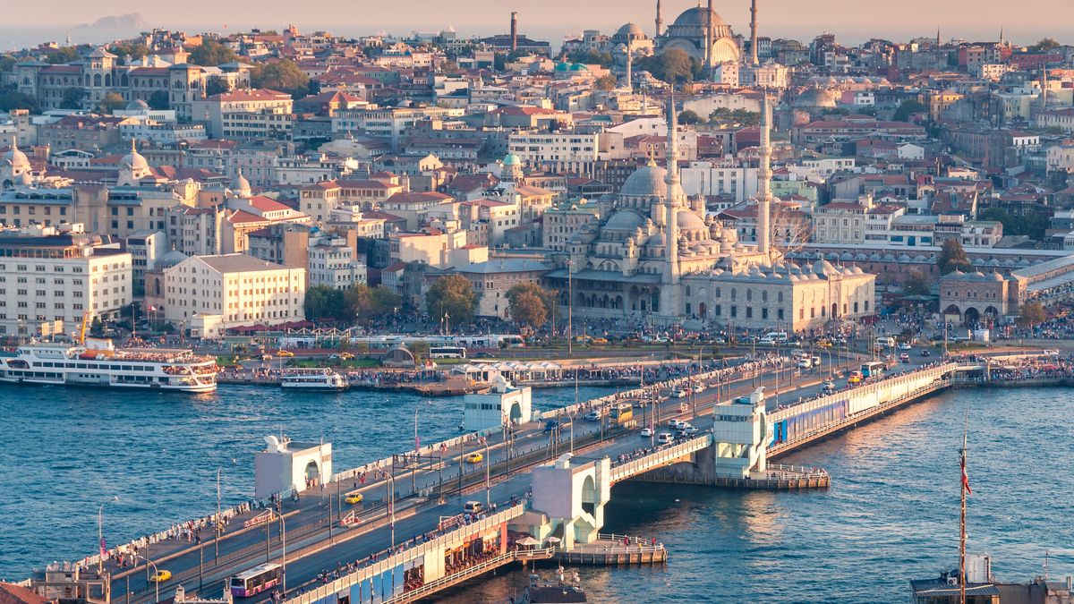 Beautiful aerial view of Istanbul historic centre with Galata bridge
Beautiful sunset aerial cityscape of Istanbul historic centre with Galata bridge and mosques. Istanbul, Turkey
Olga Kashubin
Istanbul, Turkey, cityscape, skyline, aerial, mosque, minaret, galata, bridge, fatih, city, turkish, panorama, Bosporus, urban, building, travel, destination, tourism, historical, beautiful, oriental, evening, east, town, middle, sunrise, heritage, boat, light, eastern, exterior, blue mosque, historic, street, architecture, islam, blue, summer, sunset, istambul, orient, scenery, panoramic