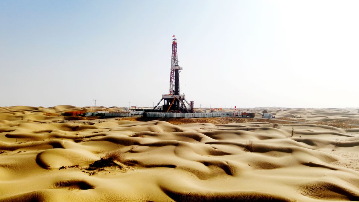 AKSU, CHINA - MARCH 13: Aerial view of an oil well of Tarim Oilfield at Taklimakan Desert on March 13, 2024 in Aksu Prefecture, Xinjiang Uygur Autonomous Region of China. An oil well at Tarim Oilfield was drilled to 8950 meters on March 13 in 102.29 days, breaking the record for the fastest vertical drilling in China. (Photo by VCG/VCG via Getty Images)