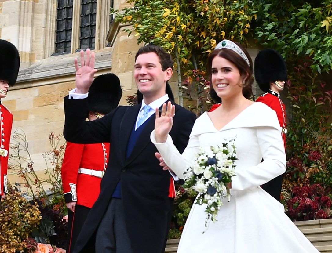 Princess Eugenie Of York Marries Mr. Jack BrooksbankWINDSOR, ENGLAND - OCTOBER 12: Princess Eugenie of York and husband Jack Brooksbank wave as they walk down the West Steps as they leave St George's Chapel in Windsor Castle following their wedding on October 12, 2018 in Windsor, England. (Photo by Victoria Jones - WPA Pool/Getty Images)WPA Pool