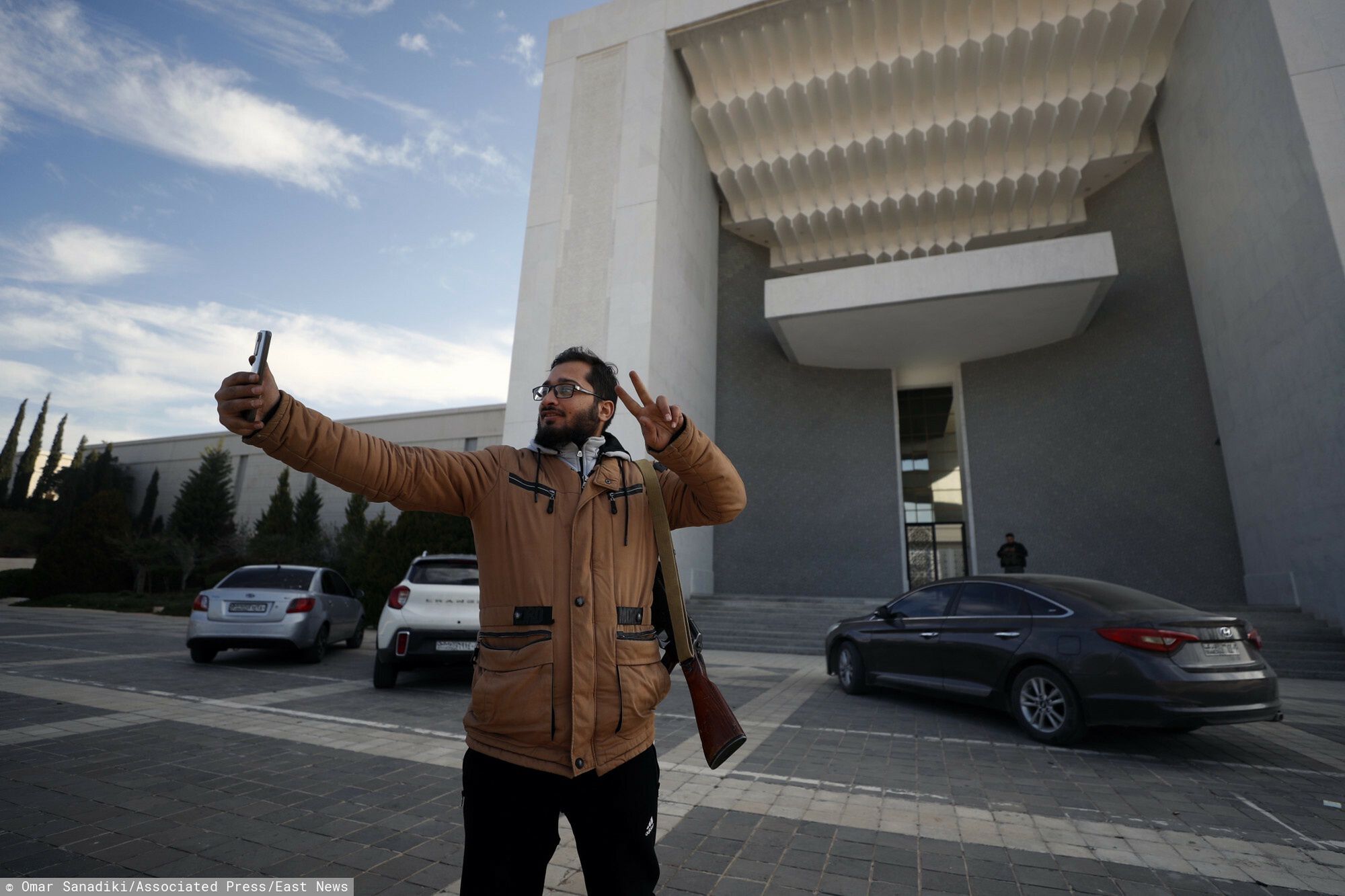 Temporary
A Syrian opposition fighter takes a selfie inside the Presidential Palace after the Syrian government collapsed, in Damascus, Syria, Sunday Dec. 8, 2024. (AP Photo/Omar Sanadiki)
Omar Sanadiki