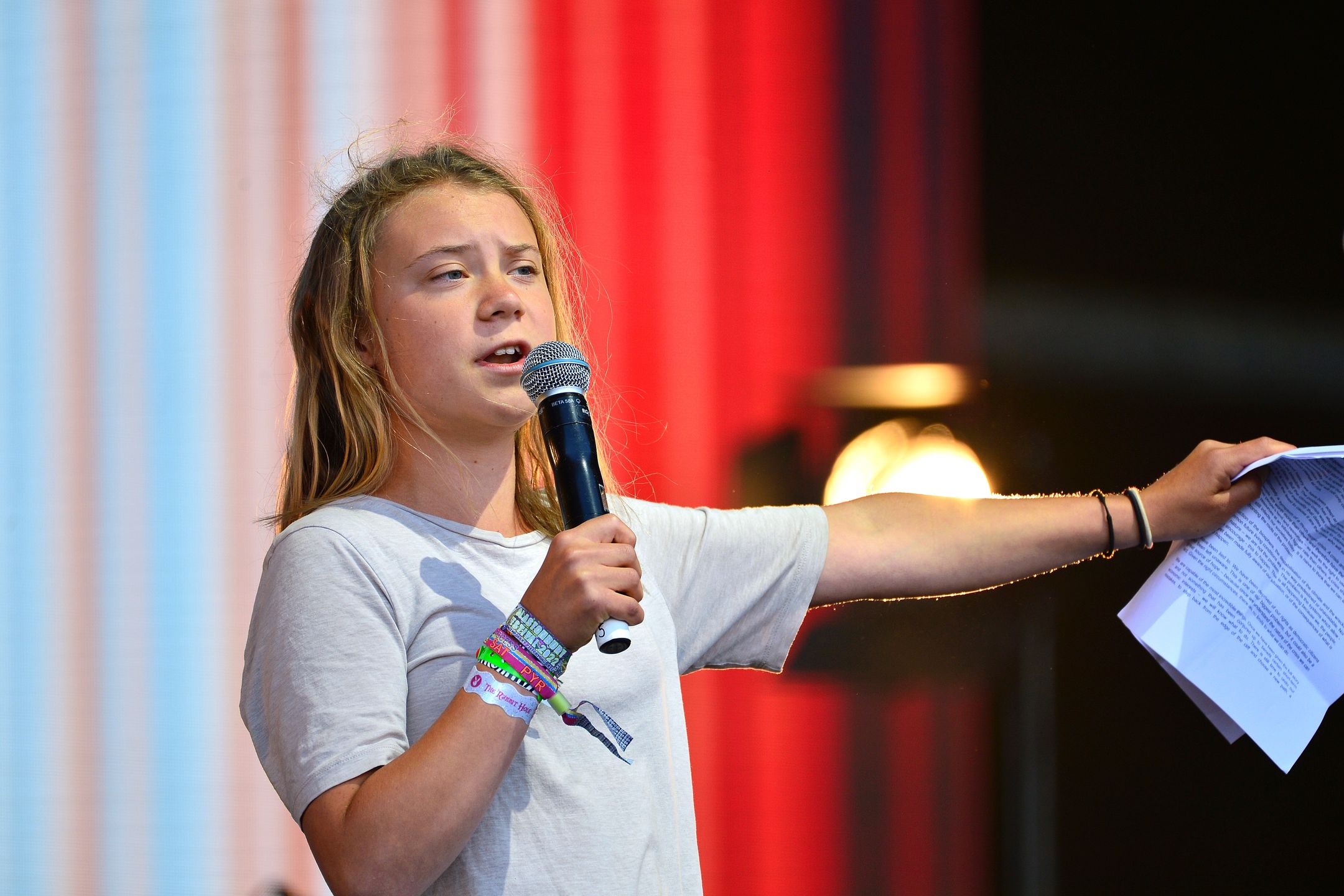 GLASTONBURY, ENGLAND - JUNE 25: Climate activist Greta Thunberg speaks on the Pyramid stage during day four of Glastonbury Festival at Worthy Farm, Pilton on June 25, 2022 in Glastonbury, England. The 50th anniversary of Glastonbury’s inaugural event in 1970 was postponed twice after two cancelled events, in 2020 and 2021, due to the Covid pandemic. The festival, founded by farmer Michael Eavis, is the largest greenfield music and performing arts festival in the world. (Photo by Jim Dyson/Getty Images)