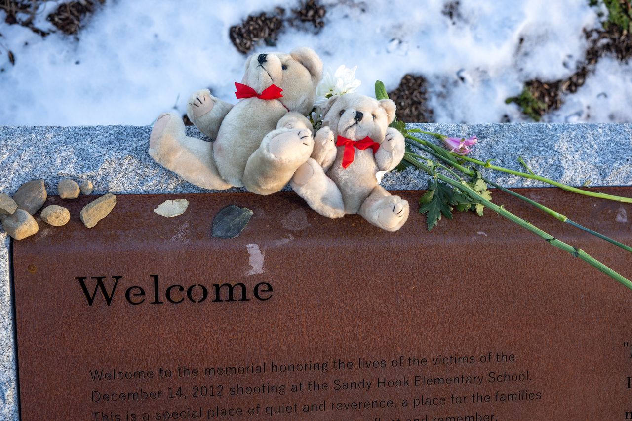 NEWTOWN, CONNECTICUT - DECEMBER 14:  Teddy Bears lie atop a plaque at the entrance of the Sandy Hook Permanent Memorial on the 10th anniversary of the school shooting on December 14, 2022 in Newtown, Connecticut. December 14 marked the 10th anniversary of the 2012 massacre at Sandy Hook Elementary where 26 people were shot and killed, including 20 first graders and 6 educators, in one of the deadliest elementary school shootings in U.S. history. The memorial opened to the public on November 14, a month ahead of the anniversary of the tragedy. (Photo by John Moore/Getty Images)