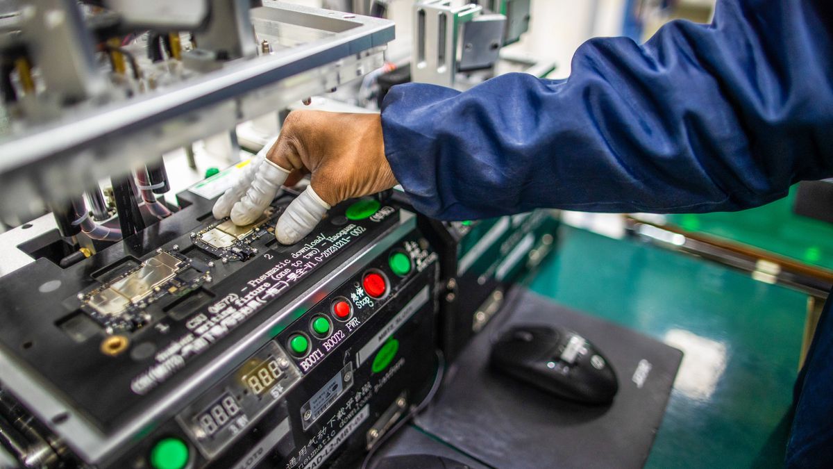 An employee works on the SMT (surface mount technology) shop floor where components are mounted on a PCB (printed circuit board) at Padget Electronics Pvt., a subsidiary of Dixon Technologies Ltd., in Noida, India, on Friday, March 22, 2024. Dixon Technologies Ltd., an Indian contract manufacturer, is benefitting from a boom in new business from clients like Chinese smartphone maker Xiaomi Corp. and South Korea's Samsung Electronics Co. wishing to use its factories to manufacture goods for India's rising middle class. Photographer: Prashanth Vishwanathan/Bloomberg via Getty Images