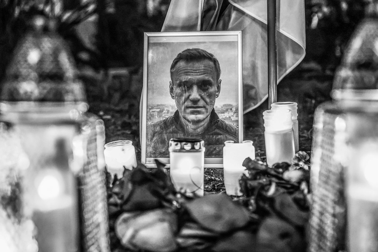 (EDITOR'S NOTE: Image was converted to black and white) Flowers and candles are seen during a vigil for Alexiei Navalny in front of the Russian Consulate General in Krakow, Poland on February 16, 2024. Navalny, 47, Russian opposition politician, died this morning in the Russian prison about 40 miles north of the Arctic Circle, where he had been sentenced to 19 years. (Photo by Beata Zawrzel/NurPhoto via Getty Images)