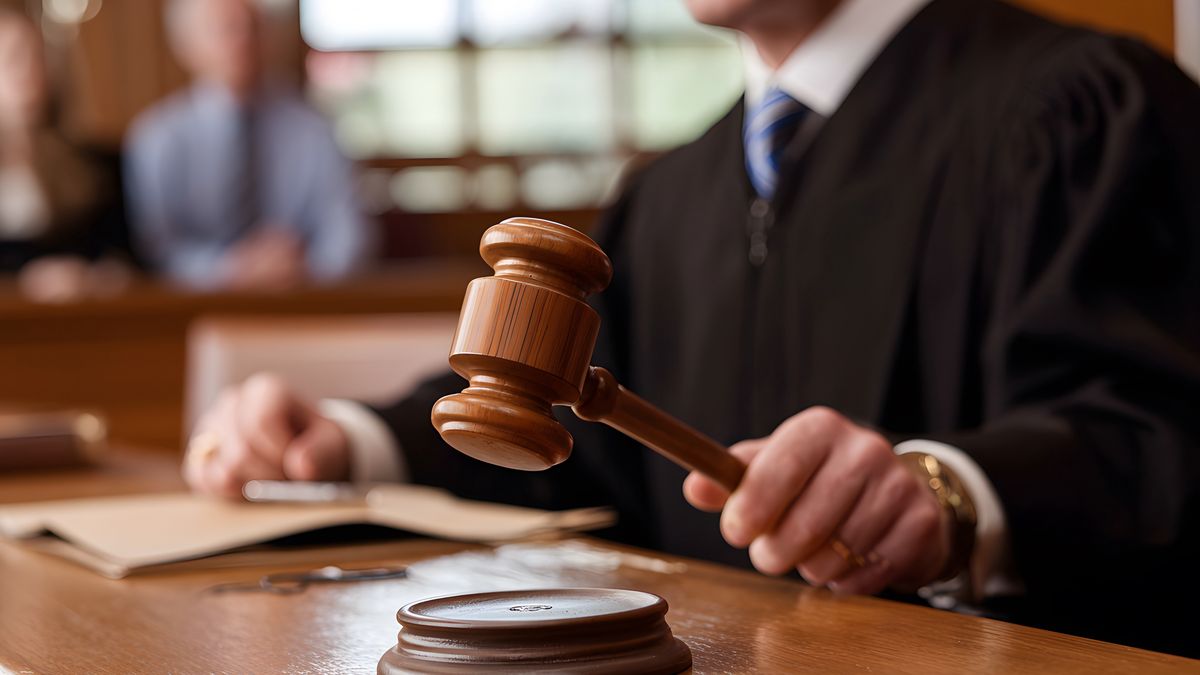 Experienced judge presiding over court hearing, gavel poised for decision, justice served professionallyjudge, court, law, legal, justice, trial, gavel, decision, verdict, courtroom, judgment, jurisprudence, judge, court, law, legal, justice, trial, gavel, decision, verdict, courtroom, judgment, jurisprudence