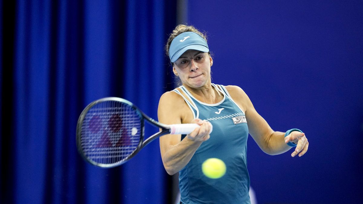 ZHUHAI, CHINA - OCTOBER 24: Magda Linette of Poland in action the match against Barbora Krejcikova of Czech Republic in the women's singles 1st round match on Day 1 of the WTA Elite Trophy Zhuhai 2023 at Hengqin Tennis Center on October 24, 2023 in Zhuhai, China. (Photo by Fred Lee/Getty Images)