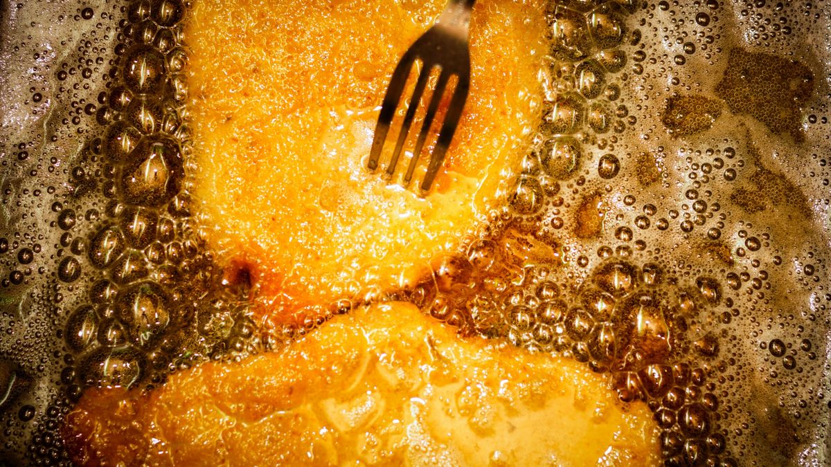 Directly Above Shot Of Milanese With ForkAndres Ruffo / EyeEmBubble, Cooking, Cooking Oil, Directly Above, Food, Food And Drink, Fork, Fried, Fried Chicken, Frying Pan, Heat - Temperature, Indoors, Italian Culture, Italian Food, Milanese, No People, Orange Color, Unhealthy Eating, Mendiolaza, Argentina