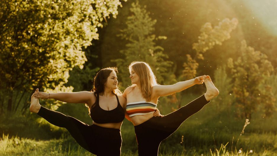Two women with long hair doing yoga on a sunny day.
Two beautiful women with long hair doing yoga in nature on a sunny summer day. Body positive, sports for women and couple, harmony, asana, healthy lifestyle, inspiring look, self-love and wellness.
yoga, woman, fitness, asana, body positive, female, girl, body, health, healthy, lifestyle, people, relaxation, young, adult, beautiful, exercise, meditation, nature, pose, sport, fit, outdoor, park, summer, sunset, care, hands, slim, trees, beauty, concentration, balance, energy, relax, activity, athlete, brunette, clothing, pilates, practicing, sun rays, wellness, plus size, weight, friend, couple, together, curvy, long hair