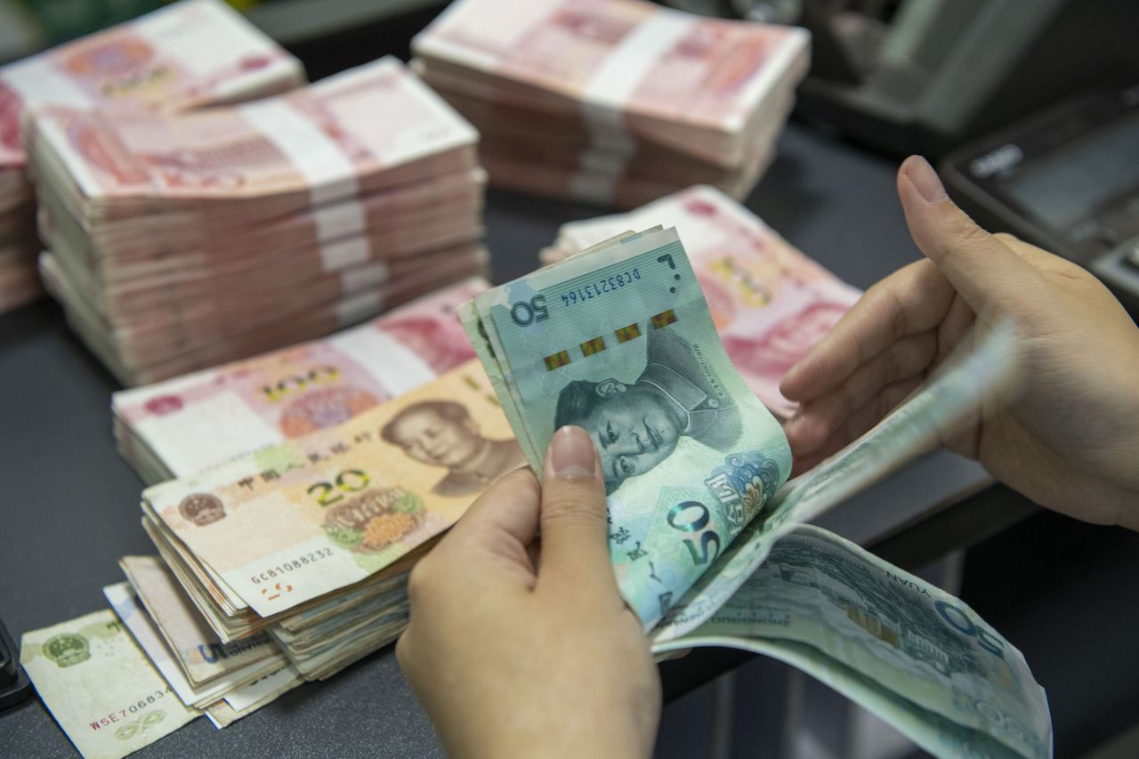 Russia's yuan dilemma: Sanctions strain Putin's financial system