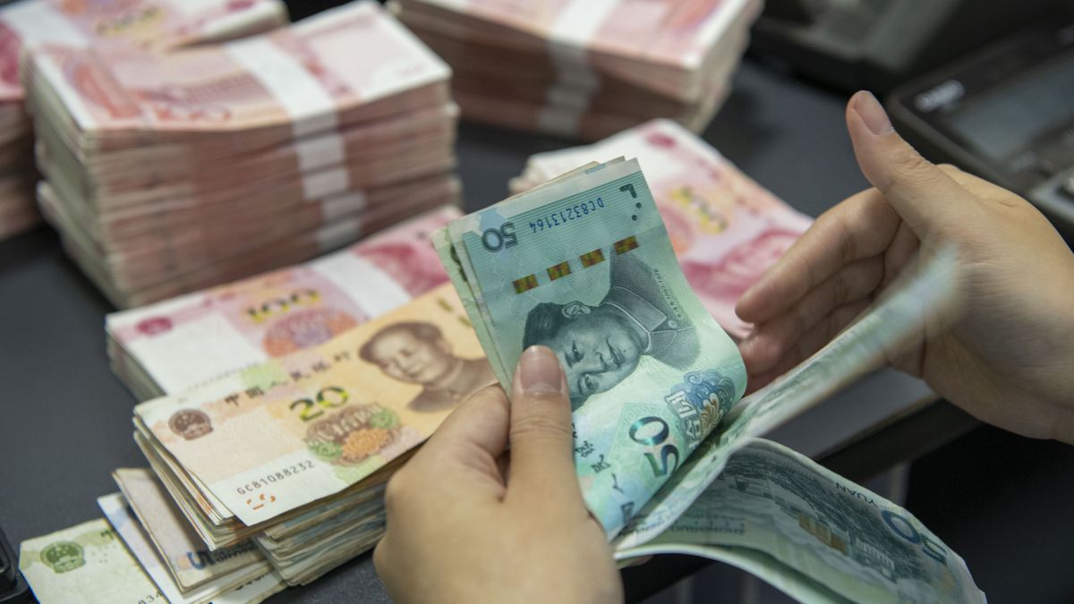 The People's Bank of China Lowered The Reserve Requirement Ratio For Financial Institutions
HAIAN, CHINA - SEPTEMBER 15, 2023 - A staff member counts Chinese Yuan at a bank's personal finance business service area in Haian, East China's Jiangsu province, Sept 15, 2023. The People's Bank of China announced on September 14 that the People's Bank of China decided to cut the deposit reserve ratio of financial institutions by 0.25 percentage points on September 15, 2023 (excluding financial institutions that have implemented the 5% deposit reserve ratio). After this cut, the weighted average deposit reserve ratio of financial institutions will be about 7.4%. (Photo credit should read CFOTO/Future Publishing via Getty Images)
CFOTO
bank, rmb, china yuan, china, reserve, loan, invest