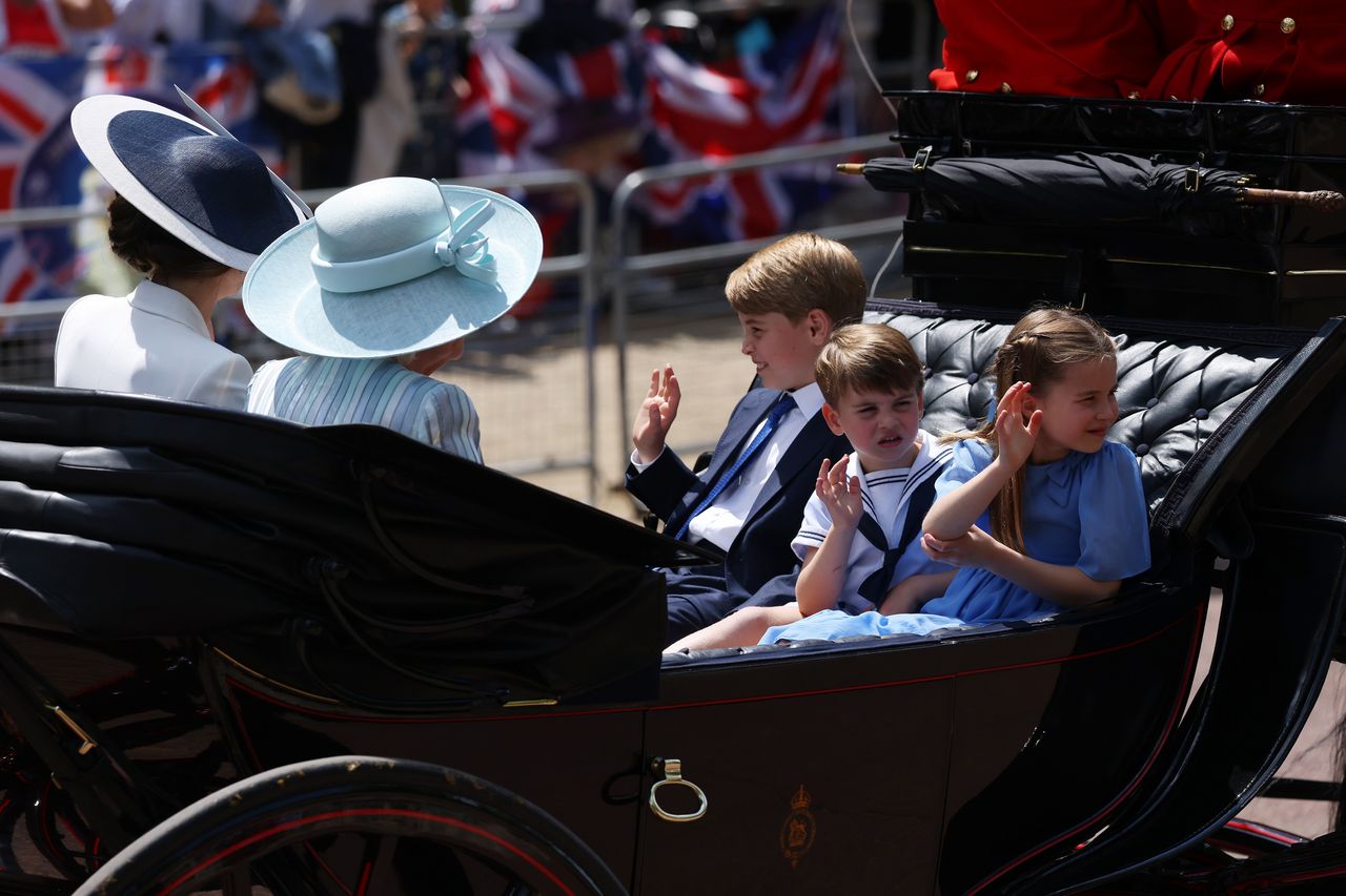 Prince George of Cambridge, Prince Louis of Cambridge and Princess Charlotte of Cambridge, ride with Kate, the Duchess of Cambridge, and Camilla, the Duchess of Cornwall, during Trooping of the Colour as part of the Platinum Jubilee celebrations, in London, UK, on Thursday, June 2, 2022. The Platinum Jubilee is a year of celebrations in the UK and Commonwealth countries to mark the 70th anniversary of the accession of Queen Elizabeth II on Feb. 6, 1952, which culminates with a four-day bank holiday weekend. Photographer: Hollie Adams/Bloomberg via Getty Images
