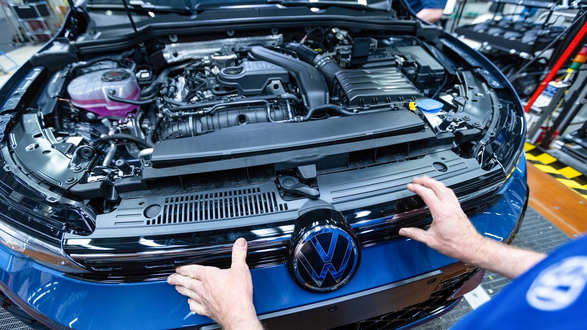 An employee works on a VW Golf on the assembly line at the Volkswagen AG factory in Wolfsburg, Germany, on Thursday, May 23, 2024. Auto sales in Europe rose 12% in April as manufacturers including Volkswagen AG and Renault SA benefited from robust demand for plug-in and conventional cars in several major markets. Photographer: Krisztian Bocsi/Bloomberg via Getty Images