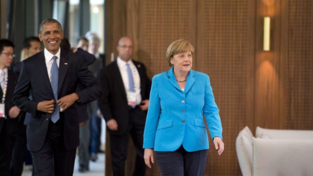 Barack Obama i Angela Merkel przed pierwszą sesją szczytu G7