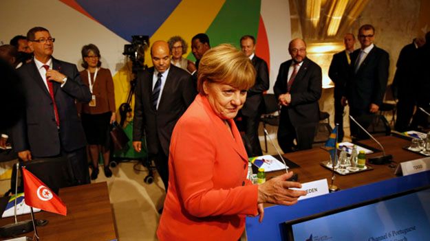 Angela Merkel podczas rozpoczynającego się szczytu