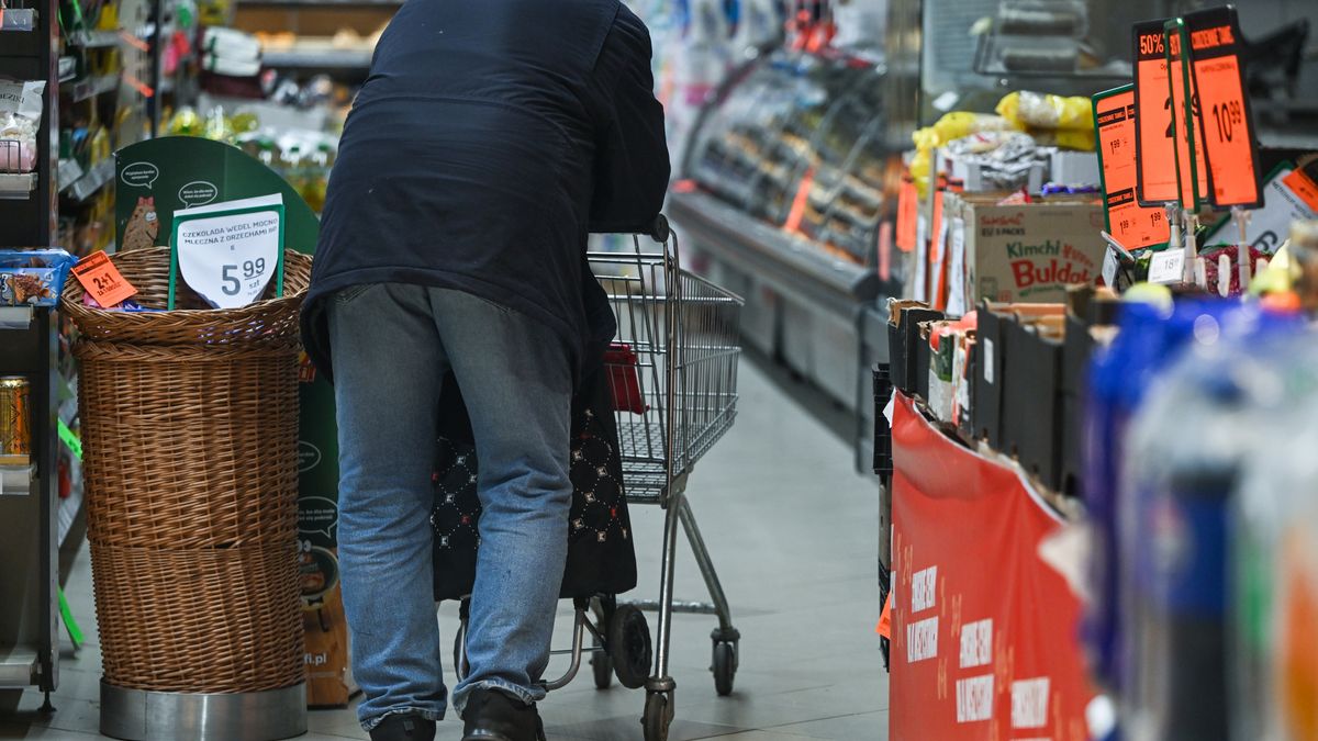 KRAKOW, POLAND - DECEMBER 23:   
An elderly customer seen inside a supermarket, pushing his trolley, on December 23, 2024 in Krakow, Poland. (Photo by Artur Widak/NurPhoto via Getty Images)