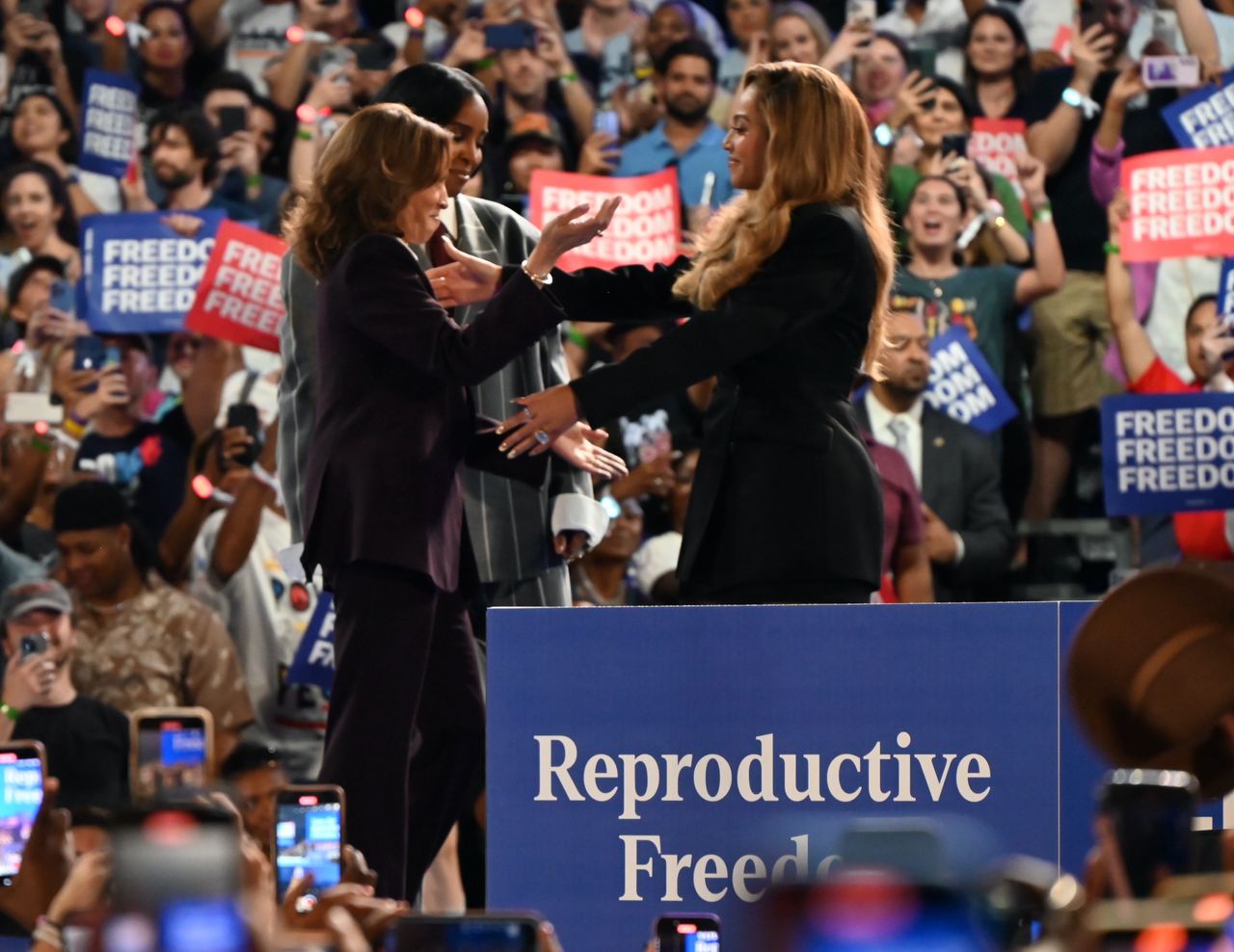 HOUSTON, TEXAS, UNITED STATES - OCTOBER 25: Beyonce greets Kamala Harris during a campaign rally in support of US Vice President and Democratic presidential nominee Kamala Harris on 'Reproductive Freedom' at Shell Energy Stadium in Houston, Texas, United States on October 25, 2024. (Photo by Kyle Mazza/Anadolu via Getty Images)