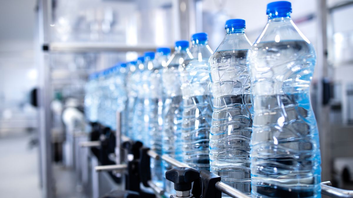 Plastic bottles on conveyor belt being filled with drinking water.
water, bottle, factory, production, bottling, plant, bottling factory, bottling plant, automated, conveyor, machine, in row, mineral, carbonated, sparkling, drink, beverage, liquid, manufacturing, processing, industry, line, production line, bottled, filling, package, automatic, automation, equipment, process, packing, producing, plastic, pure, purification, controlling, technology, modern, quality, control, cap, PET, industrial