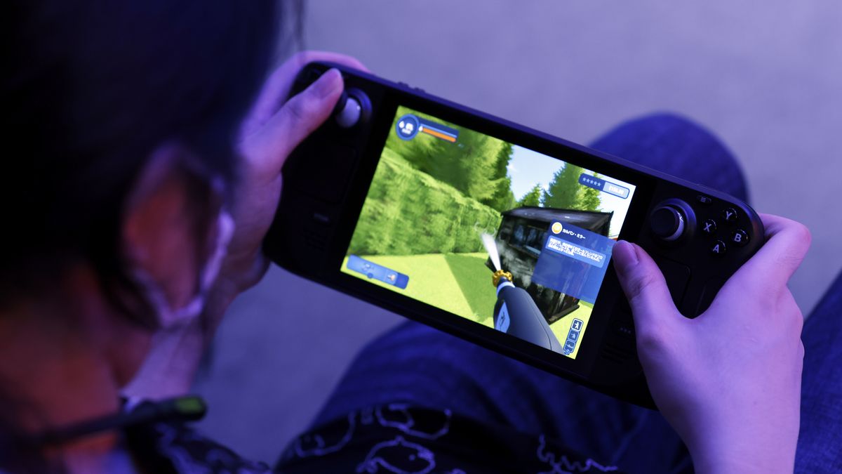 An attendee plays a video game on a Valve Corp. Steam Deck handheld gaming computer at the Tokyo Game Show 2022 in Chiba, Japan, on Thursday, Sept. 15, 2022. The show runs through to Sept. 18. Photographer: Kiyoshi Ota/Bloomberg via Getty Images
