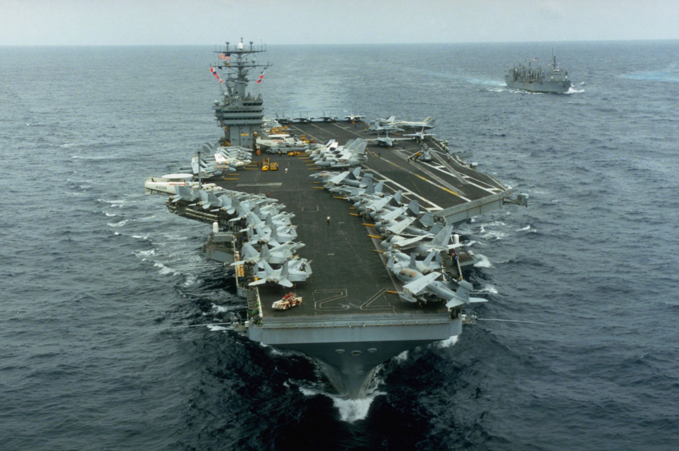 USS Abraham LincolnA bow view of the nuclear-powered aircraft carrier USS Abraham Lincoln (CVN-72) underway. The replenishment oiler USS Roanoke (AOR-7) is at right. Pacific Ocean, June 1991. (Photo by © CORBIS/Corbis via Getty Images)Historicalaircraft carrier:CB3, people:CB1, ocean:CB2, Pacific Ocean:CB2