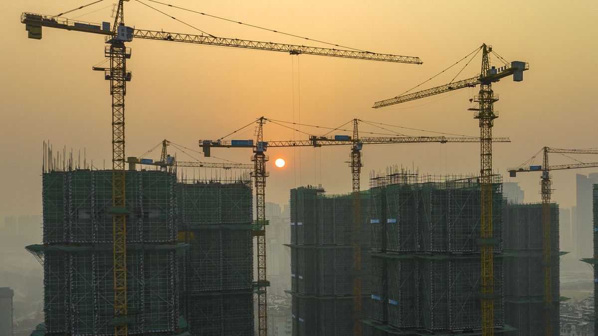 HUAI'AN, CHINA - JANUARY 6, 2023 - Workers work at a real estate construction site in Huai 'an City, East China's Jiangsu Province, Jan 6, 2023. (Photo credit should read CFOTO/Future Publishing via Getty Images)