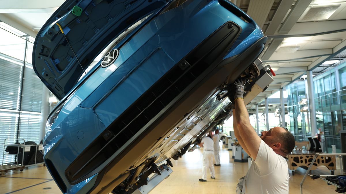 DRESDEN, GERMANY - MAY 14: Workers assemble Volkswagen ID.3 electric cars at the Volkswagen plant on May 14, 2025 in Dresden, Germany. Volkswagen led sales of electric car sales in Germany that rose 54% overall in April compared to April of last year. (Photo by Sean Gallup/Getty Images)