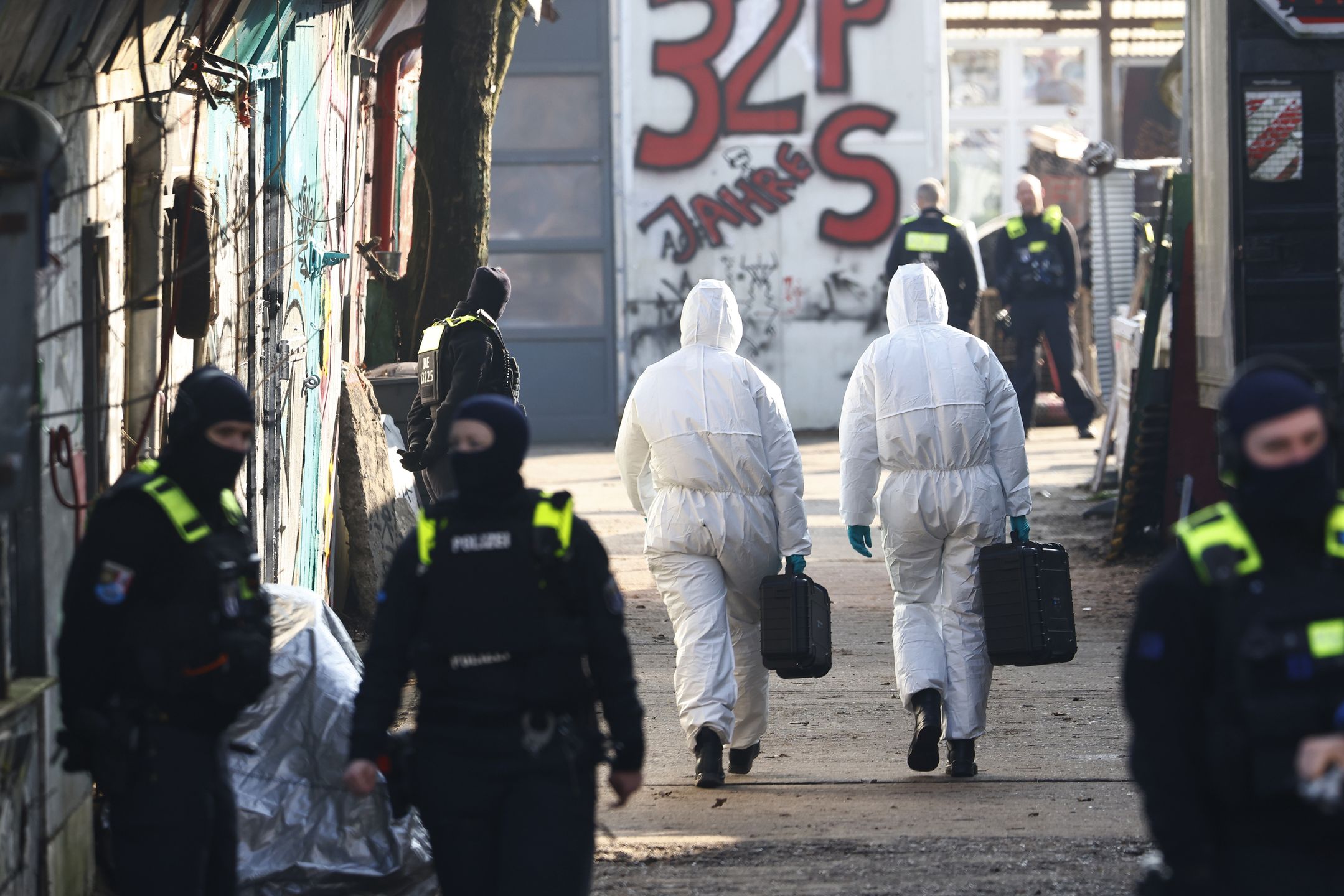 BERLIN, GERMANY - MARCH 3: Police attend near a commercial property in Friedrichshain district where they were seeking RAF terror group members Ernst-Volker Staub and Burkhard Garweg on March 3, 2024 in Berlin, Germany. The hunt by law enforcement for the two men has intensified since the recent arrest of a third member of the group, Daniela Klette, in Berlin. The three were among the so-called "third generation" of the Red Army Faction, a leftist terror group that was responsible for politically motivated murders, kidnappings and attacks in the 1980s and 90s, but also supermarket and money transport robberies in the 2000s. (Photo by Michele Tantussi/Getty Images)