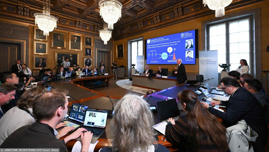 Temporary
Member of the Nobel Committee For Physics Mats Larsson speaks to the media during the announcement of the winners of the 2023 Nobel Prize in Physics at Royal Swedish Academy of Sciences in Stockholm on October 3, 2023. France's Pierre Agostini, Hungarian-Austrian Ferenc Krausz and French-Swedish Anne L'Huillier on Tuesday won the Nobel Physics Prize for research into tools for exploring electrons inside atoms and molecules. (Photo by Jonathan NACKSTRAND / AFP)
JONATHAN NACKSTRAND