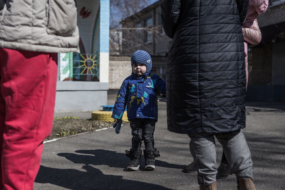 ZAPORIZHIA, UKRAINE - MARCH 23: Some refugees from Mariupol, after traveling all day on the buses provided by the government, humanitarian organizations and associations, spent the night in a kindergarten in Zaporizhia, Ukraine on March 23, 2022. (Photo by Andrea Carrubba/Anadolu Agency via Getty Images)