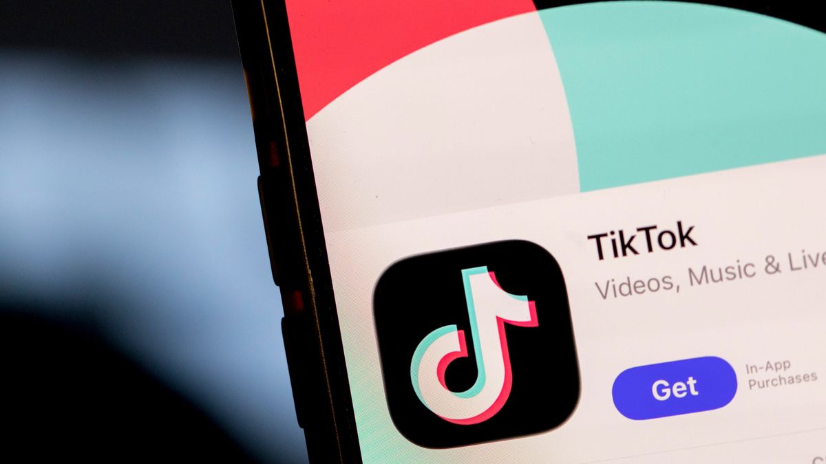 The TikTok app icon arranged on a smartphone in Sydney, Australia, on Wednesday, Dec. 3, 2025. Australia will soon ban its youth from popular services like TikTok and Instagram, becoming the world's first democracy to carry out such a crackdown in response to growing concerns about social media's harms. Photographer: Brent Lewin/Bloomberg via Getty Images