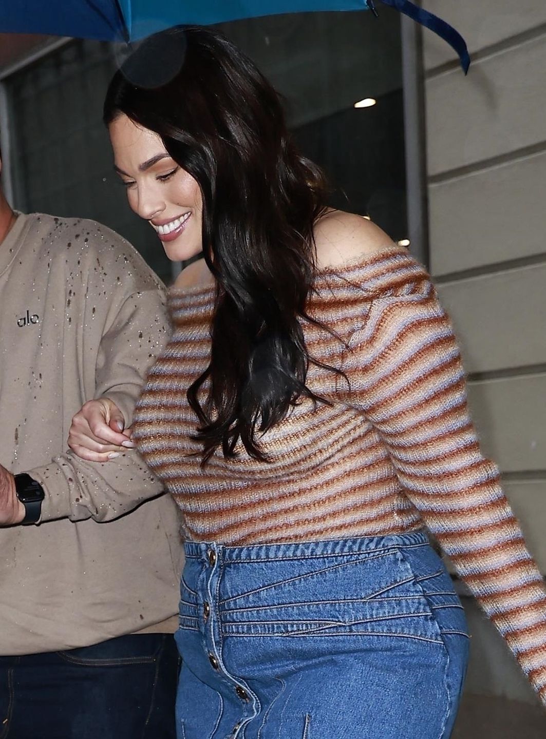 *EXCLUSIVE* Ashley Graham turns heads while exiting CBS studios in rainy NYCBACKGRID / Backgrid USA / ForumAshley Graham, Sweater Top, Blue Jeans, Jean Skirt, Model, See Through, Sheer, Fashion, Style, CBS Studios