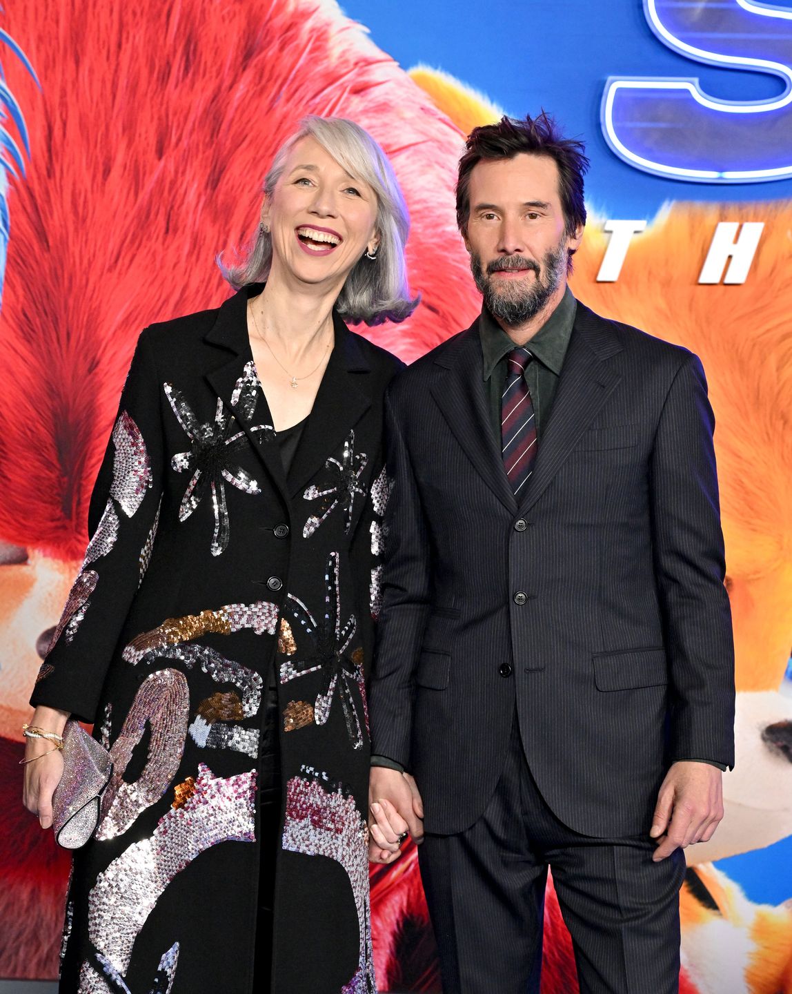 Keanu Reeves z ukochaną razem na ściance