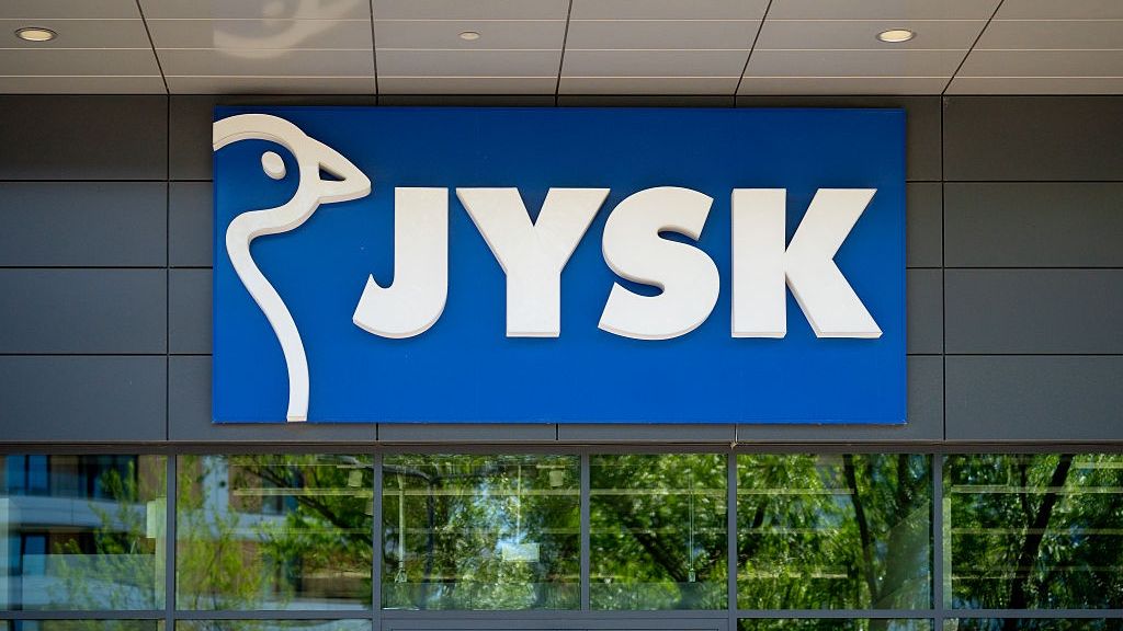 Daily Life In Krakow And Skawina, Poland.
A Jysk store logo sign is seen in Krakow, Poland, on May 10, 2026. The signboard with the brand logotype is displayed above the entrance door of the Danish retail chain's home furnishing shop. (Photo by Marcin Golba/NurPhoto via Getty Images)
NurPhoto
banner, emblem, logotype, accessories, exterior, brand, company, name, decor, signboard, shop, household, scandinavian, home, market, danish, furnishing, signage, jysk, retailer