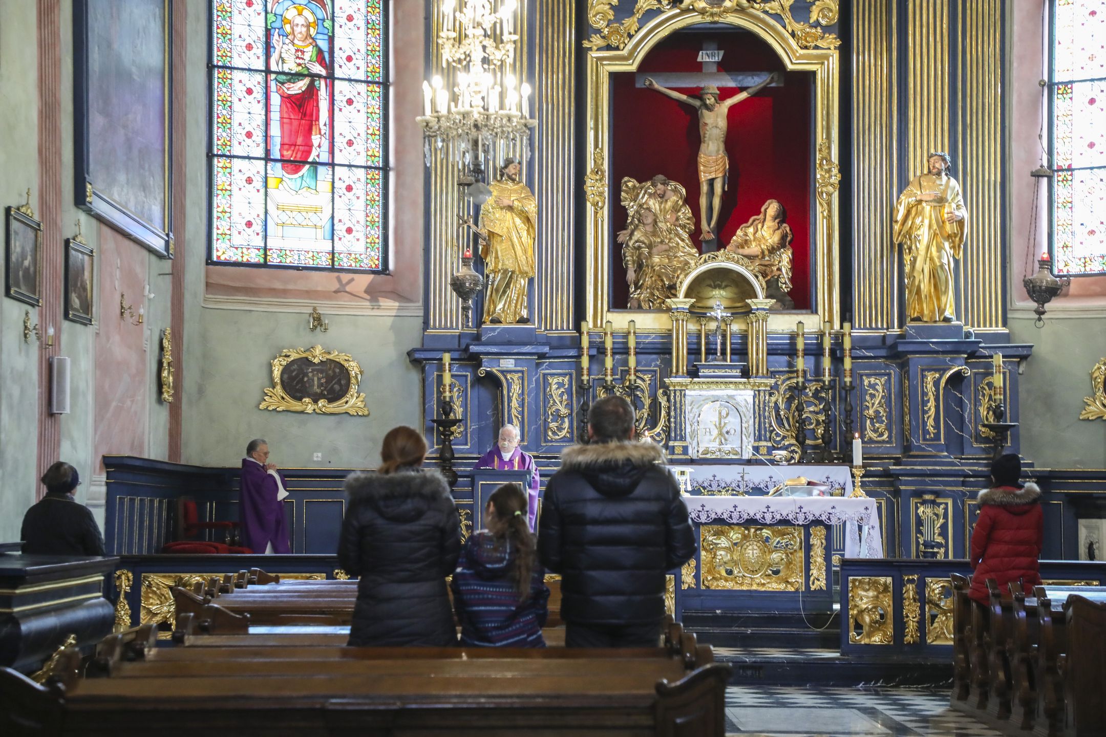 Few people attend Sunday Holy Mass at Catholic Church in Krakow, Poland on March 15, 2020. Due to the spread of coronavirus the Polish episcopate announced an exemption and invited the faithful to take part in Sunday mass via the internet, radio or television. (Photo by Beata Zawrzel/NurPhoto via Getty Images)
