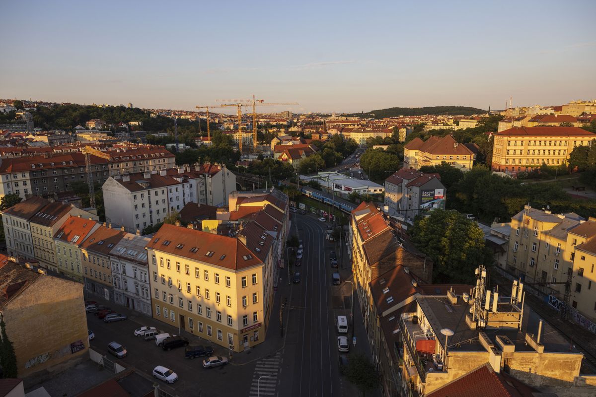 Tower cranes and traditional tenement housing across the city skyline in the Nusle district of Prague, Czech Republic, on Friday, June 10, 2022. The difference between an average Czech citizens income and real estate prices in the country is now one of the widest in the European Union, raising serious bubble fears. Photographer: Milan Jaros/Bloomberg via Getty Images