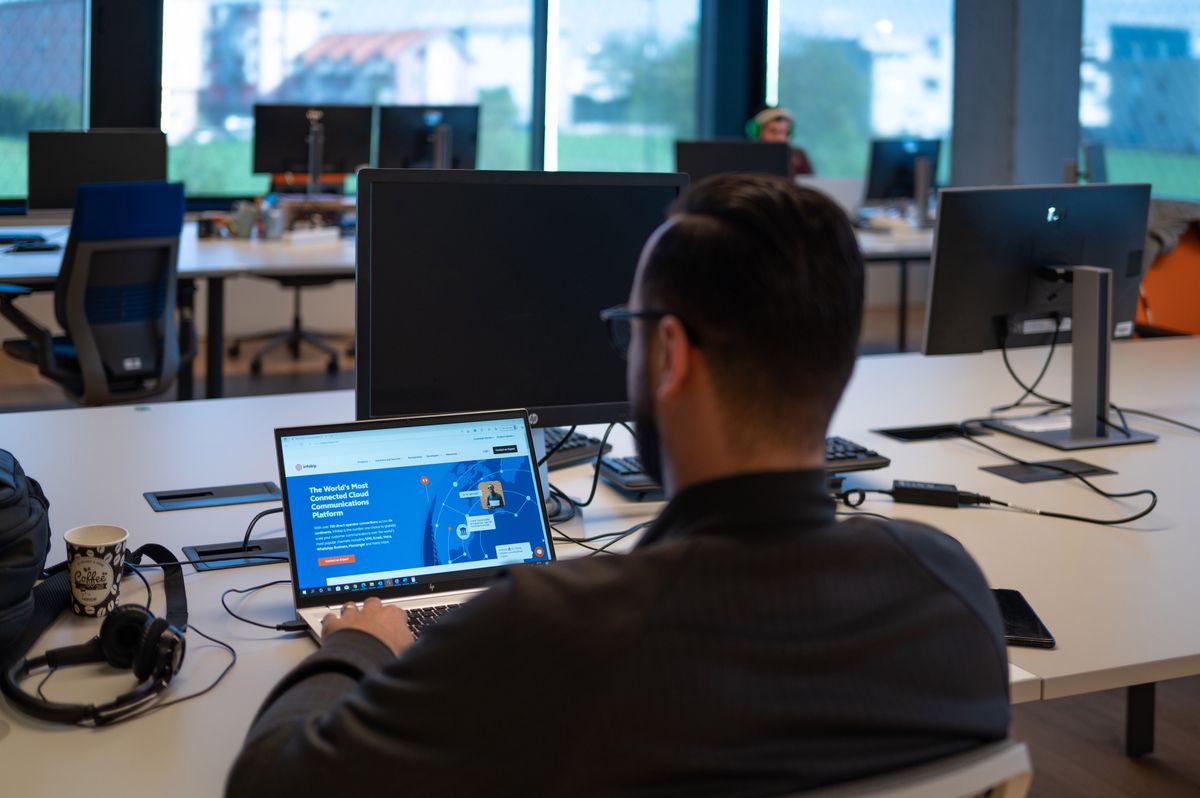 An employee works on a laptop computer at the new Infobip Ltd. tech campus in Zagreb, Croatia, on Monday, April 25, 2022. Infobip earlier this year opened the companys biggest innovation center in Zagreb, with the $21 million, eight-story building enabling a capacity of 800 employees. Photographer: Petar Santini/Bloomberg via Getty Images