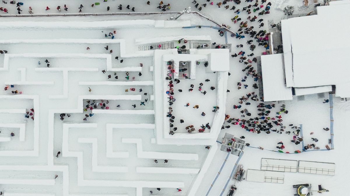 ZAKOPANE, POLAND - JANUARY 21: An aerial view of the Snowlandia Winter Theme Park's labyrinth as people try to find the way out in Zakopane, Poland on January 21, 2023. Established during the 2015/2016 winter season with an area of 2500 square meters, the labyrinth's size increased to 3000 square meters this year as it reopens. (Photo by Omar Marques/Anadolu Agency via Getty Images)