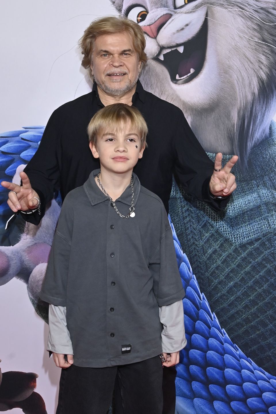 Jarosław Boberek z synem na premierze "Zwierzogrodu 2"