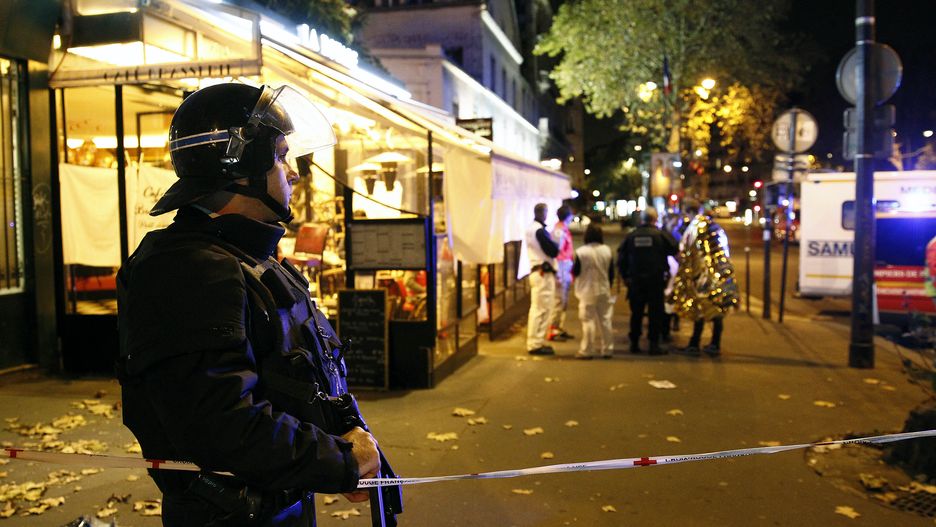 Many Dead After Multiple Shootings In ParisPARIS, FRANCE - NOVEMBER 13:  A policeman stands guard near the Boulevard des Filles-du-Calvaire after an attack November 13, 2015 in Paris, France. Gunfire and explosions in multiple locations erupted in the French capital with early casualty reports indicating at least 60 dead. (Photo by Thierry Chesnot/Getty Images)Thierry Chesnot